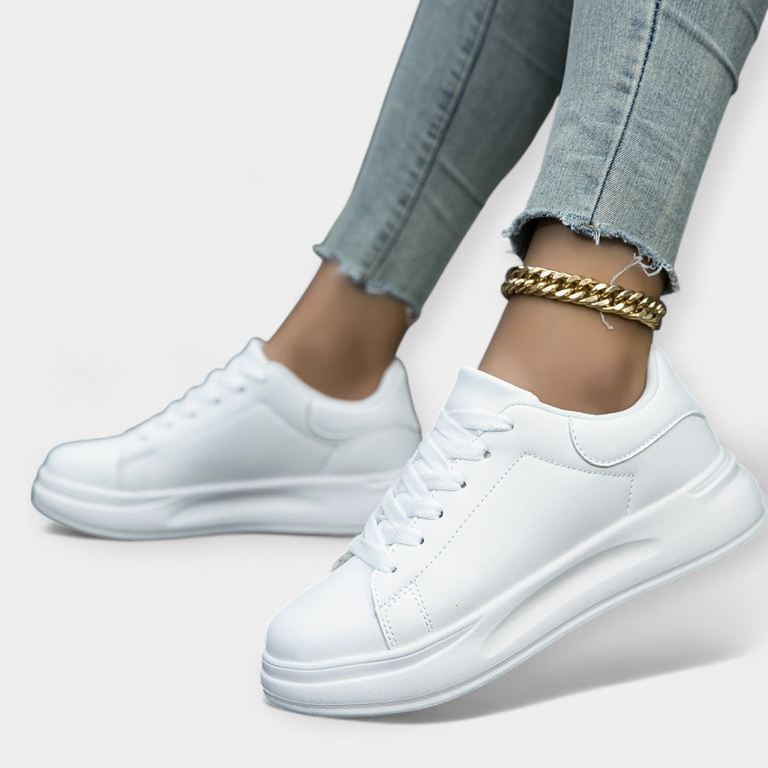 Zapatillas de piel blanca