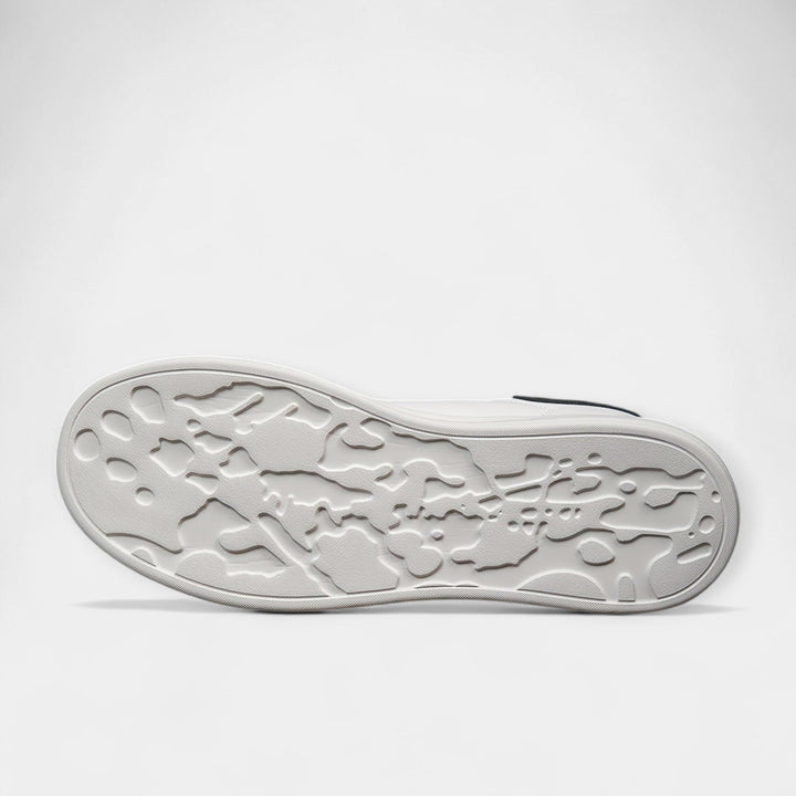 Zapatillas de piel blanca