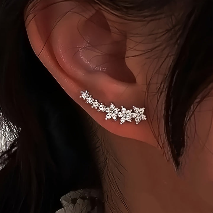 Valeria™ – Pendientes Trepadores de Brillo Floral