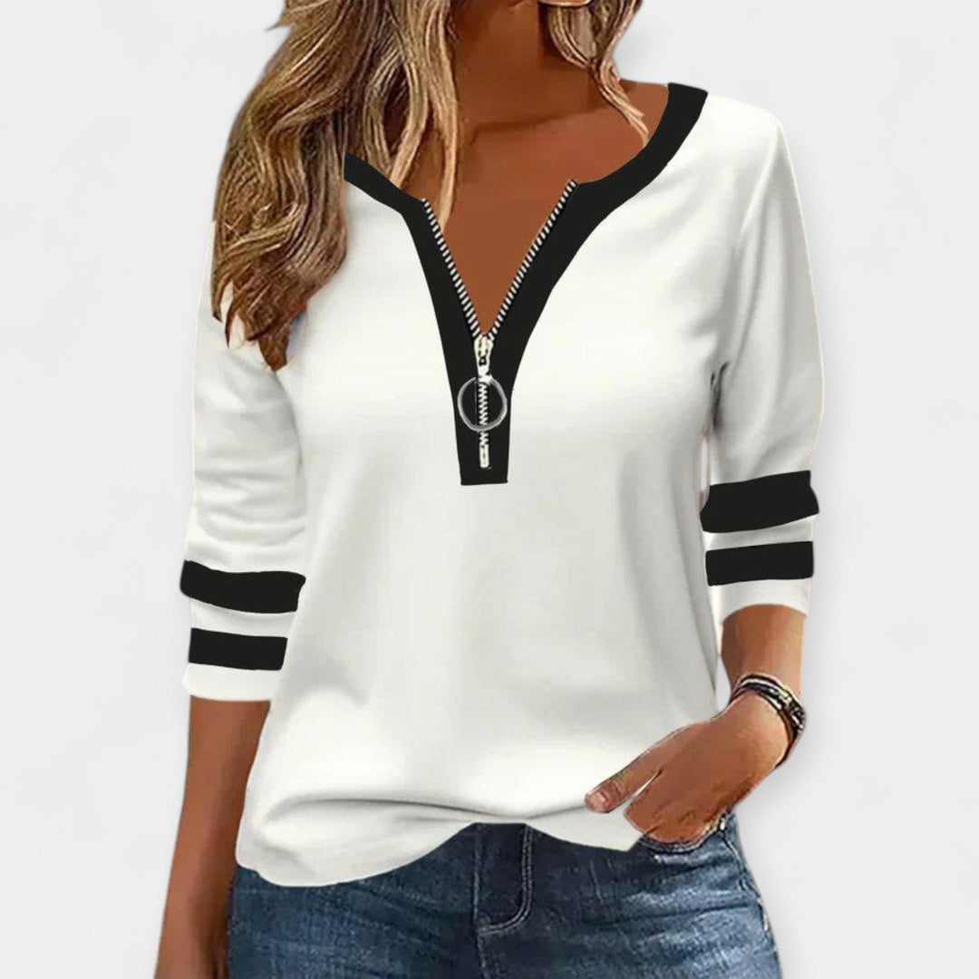 Blusa con mangas largas y cremallera