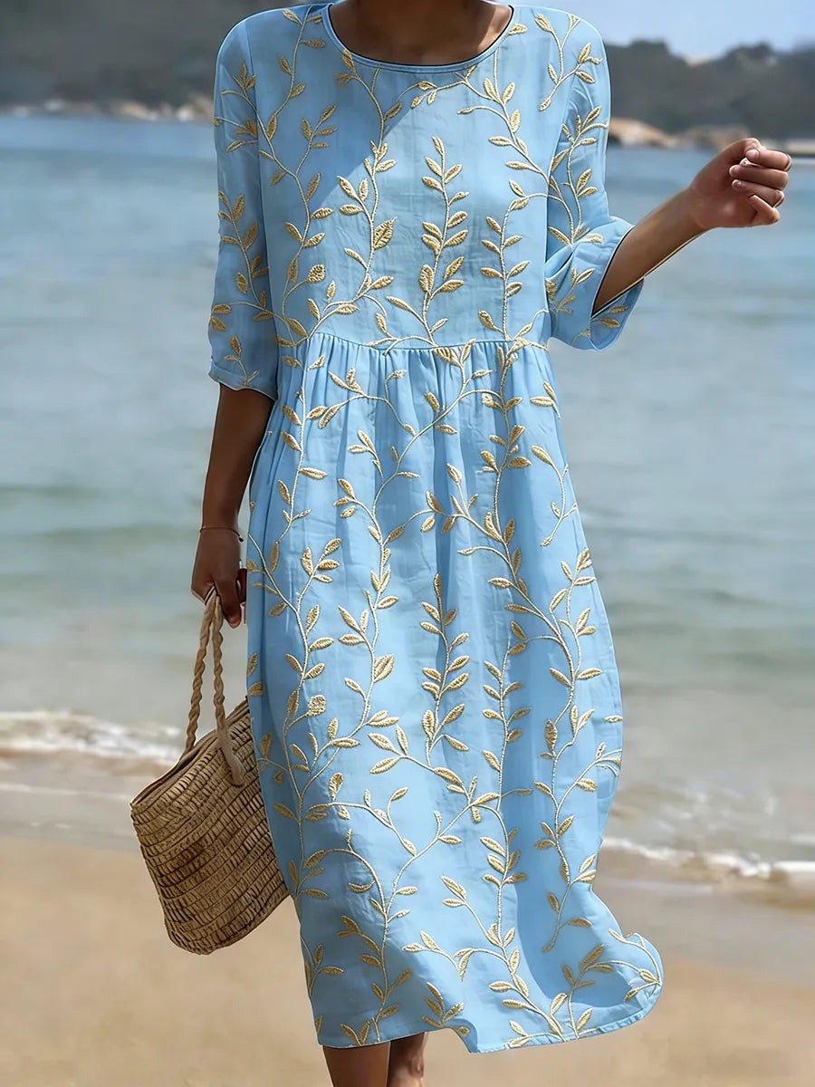 Natalie | Vestido midi con estampado floral y de hojas y escote redondo