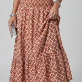 Amira | Vestido Midi Cortado con Estampado Geométrico y Cuello Halter Cruzado