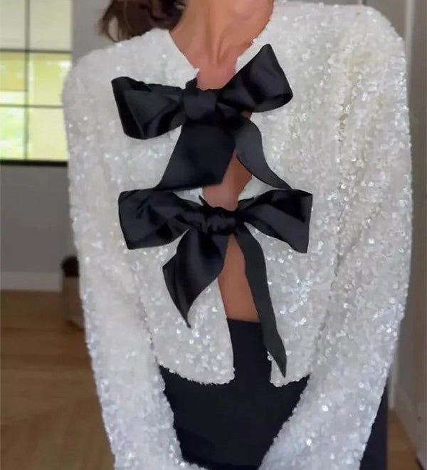 Chic Sparkling Blazer with Black Bow Accents