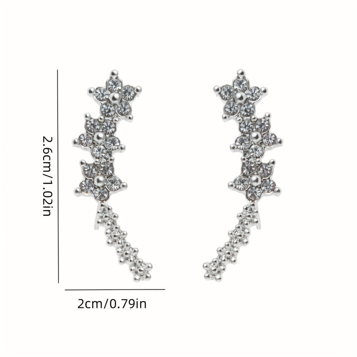 Valeria™ – Pendientes Trepadores de Brillo Floral
