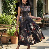 Paloma | Vestido Midi Plisado Floral con Cuello Alto y Abertura