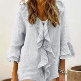 NADIA™ | Blusa con volantes y mangas acampanadas que estiliza