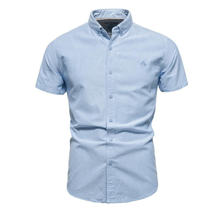 Camisa de manga corta con solapa para hombre en color liso