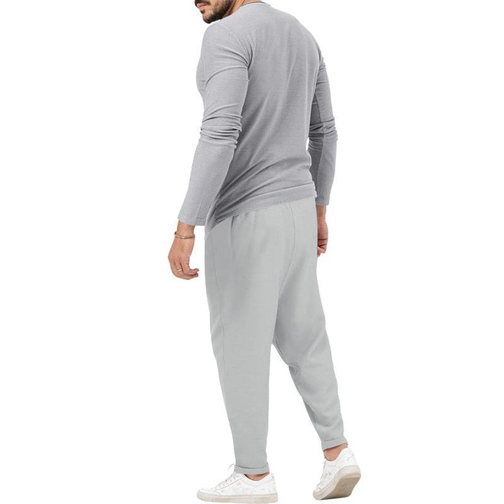 Conjunto informal de camiseta Henley de manga larga y pantalón para hombre.