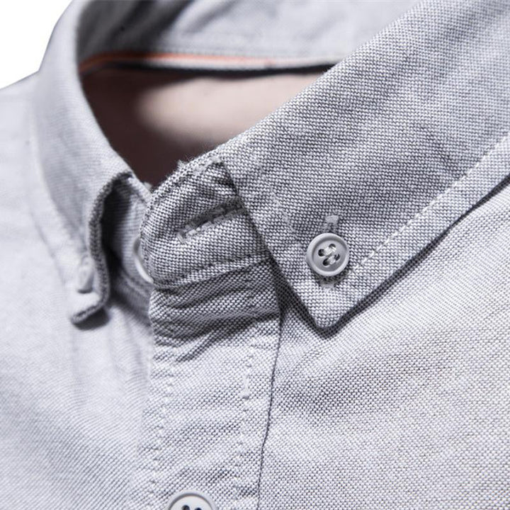 Camisa de manga corta con solapa para hombre en color liso