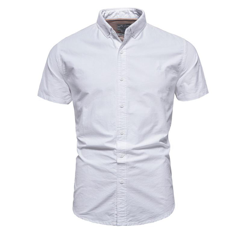 Camisa de manga corta con solapa para hombre en color liso