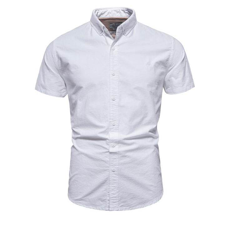 Camisa de manga corta con solapa para hombre en color liso