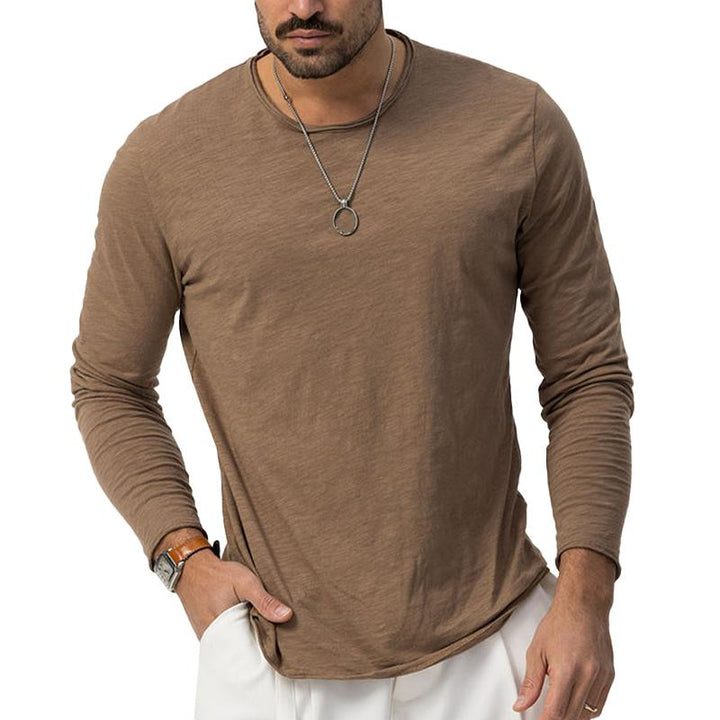 Camiseta de manga larga de color liso con cuello redondo para hombre